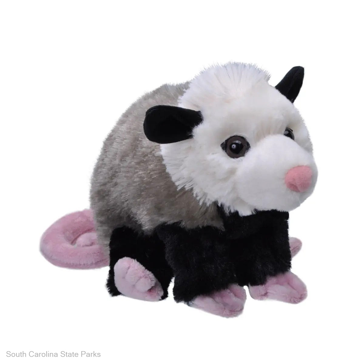 Plush toy opossum on a white background